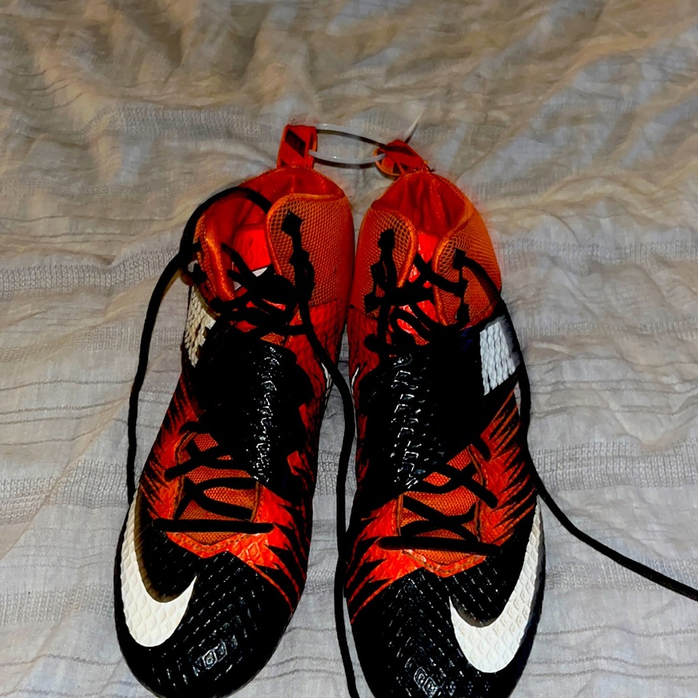Orange Nike cleats